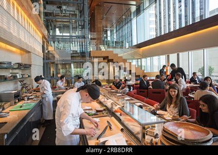 UNITED ARAB EMIRATES / Dubai /Bar with bartender at Zuma Restaurant in Dubai  United Arab Emirates Stock Photo - Alamy