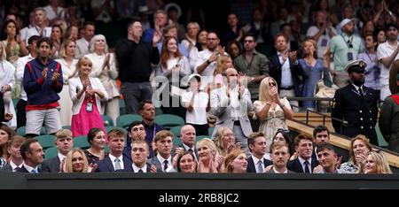 Military personnel including Members of 1st Battalion, Grenadier Guards, who were pallbearers at the funeral in 2022 of Queen Elizabeth II, in the royal box on day six of the 2023 Wimbledon Championships at the All England Lawn Tennis and Croquet Club in Wimbledon. Picture date: Saturday July 8, 2023. Stock Photo