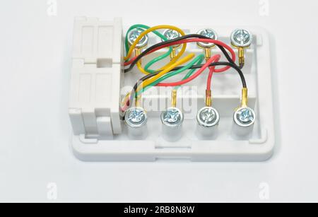 Wiring on Telephone Line Splitter isolated on gray background Stock Photo