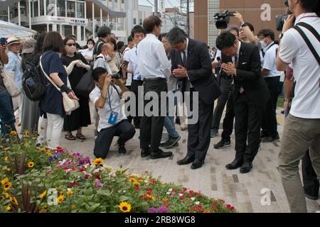 Nara, Japan. 08th July, 2023. Democratic Party for the People leader, Yuichiro Tamaki(R2) and secretary general of Democratic Party for the People, Kazuya Shinba(R3) pray during the 1st anniversary of late former President Abe's assassinated at the site where he was shot near Yamato-Saidaiji station in Nara-Prefecture, Japan on Saturday, July 8, 2023. Photo by Keizo Mori/UPI Credit: UPI/Alamy Live News Stock Photo