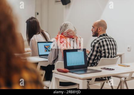 Young multicultural people having business training at the classroom Stock Photo