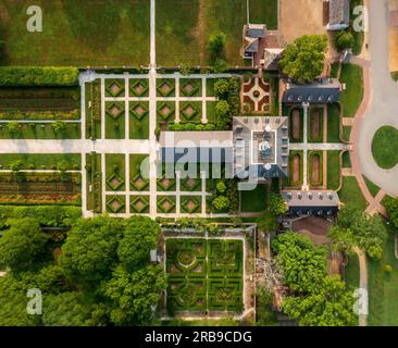 Drone top down view of roof and formal gardens of Governors Palace in Williamsburg Virginia at dawn Stock Photo