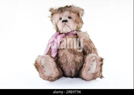 Cute fluffy teddy bear isolated on white background Stock Photo