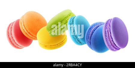 Panorama of levitating rainbow colored macaroons, isolated on white background Stock Photo