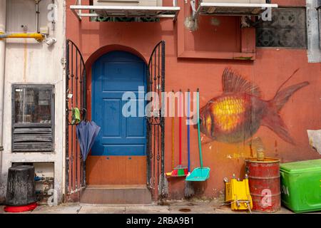 Kampong Glam, Singapore - December 19, 2022: Anonymous artwork of the back streets of the Muslim district of Kampong Glam with the representation of a Stock Photo