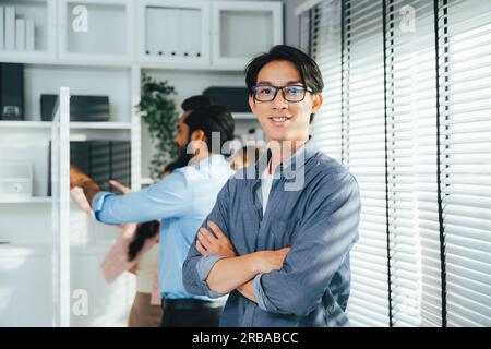 Portrait of happy business people working at modern office, Business team meeting and brainstorming at company, Employees using laptop working with Stock Photo