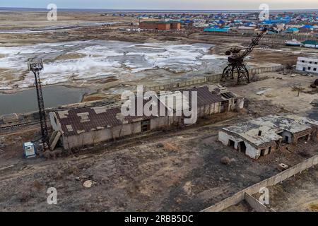 Aerial of the Aral lake and Aralsk, with its rusty cranes, Aral lake, Kazakhstan Stock Photo
