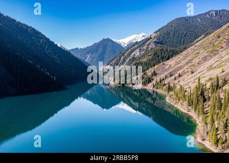 Aerial of the Lower Kolsai lake, Kolsay Lakes National Park, Tian Shan mountains, Kazakhstan Stock Photo