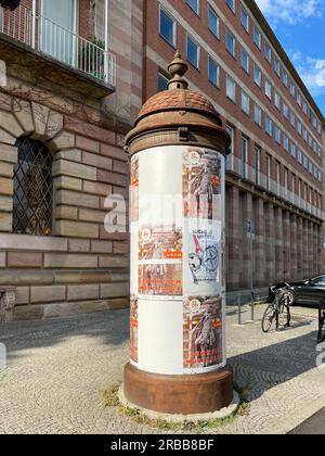 Nuremberg, Germany, July 08 2023: Lifaß at Nuremberg Digital Festival. the Litfaß, a free-standing cylindrical advertising column. Stock Photo