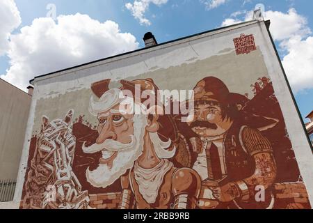 Mural Don Quixote, Don Quixote, and Sancho Panza, joint work by the graffiti artists Mesk, Fedor and Mots, street art, Porto, Portugal Stock Photo