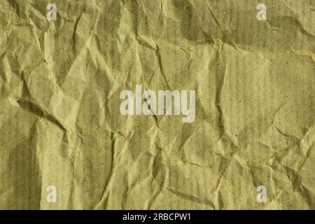 green plain paper crumpled closeup as background Stock Photo