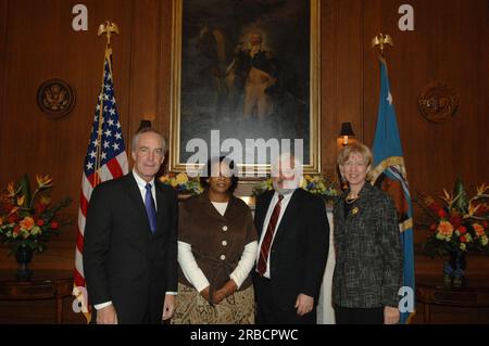 Secretary Dirk Kempthorne and aides receiving visit at Main Interior from former Interior Secretary Gale Norton and Norton's husband, John Hughes Stock Photo