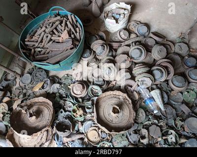 unexploded land mines and cluster bombs remains picked up all around Cambodia after war,now set in Museum of landmines in Siem Reap Cambodia, huge amo Stock Photo