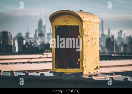 Old Police phone box on Brooklyn Bridge, New York Stock Photo