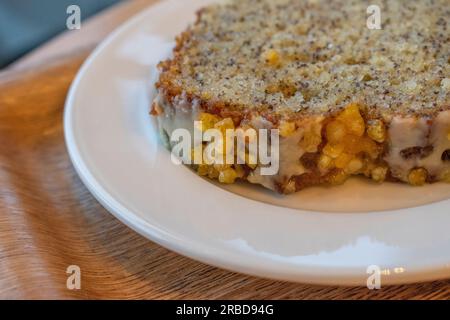 a delightful and moist cake made with lemon and yogurt, enriched with nutritious chia seeds, resulting in a delicious and healthy dessert. Stock Photo