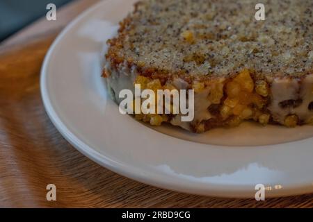 a delightful and moist cake made with lemon and yogurt, enriched with nutritious chia seeds, resulting in a delicious and healthy dessert. Stock Photo