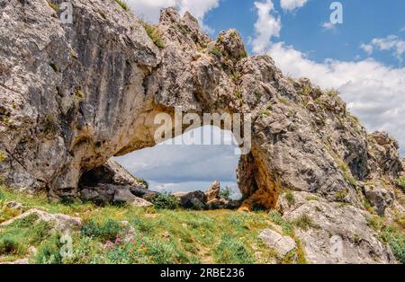 La forada or foradada arch is a pectacular stone arch, of great beauty, from which to observe the entire Vall de Gallinera, declared a Natural Site by Stock Photo