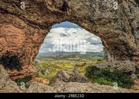 Rock arch La Forada or Foradada above the Vall de Gallinera, Alicante province, Spain Stock Photo