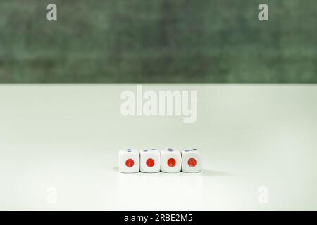 The dice can be used in many ways to obtain various distributions. The roll of several dice approaches the normal distribution more closely the more d Stock Photo