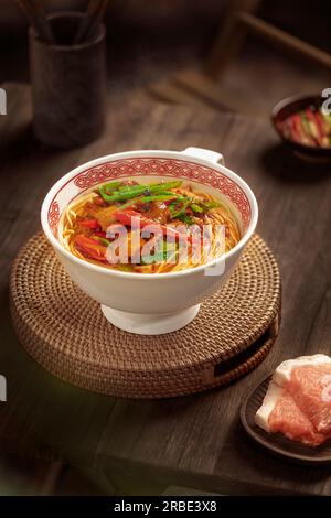 A bowl of Twice-cooked Pork Noodle Stock Photo