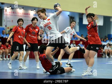 Hong Kong, China. 9th July, 2023. Wang Jingjing (3rd L) of China competes during the gold medal match between China and South Korea at the 17th Asian Women's Junior Handball Championship in Hong Kong, China, July 9, 2023. Credit: Lo Ping Fai/Xinhua/Alamy Live News Stock Photo