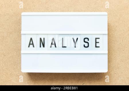 Lightbox with word analyse on wood background Stock Photo