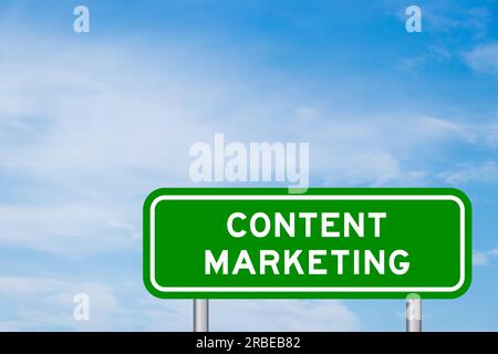 Green color transportation sign with word content marketing on blue sky with white cloud background Stock Photo