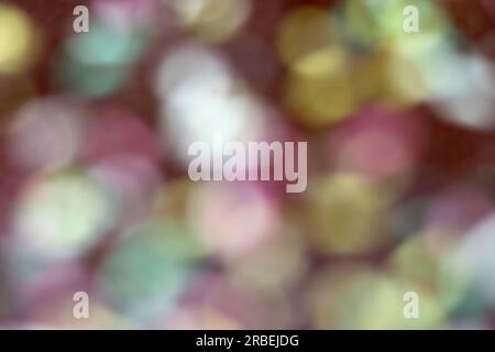 Abstract background with bokeh defocused lights and shadow. Blur dark tone multicolor light Stock Photo