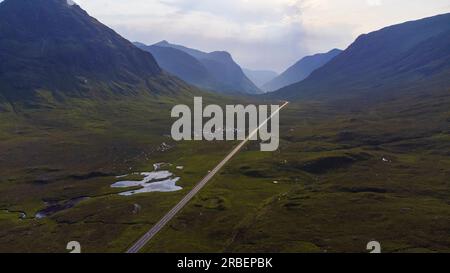 Aerial view of Buachaille Etive Mor, The Three Sisters and the Pass of Glencoe in the Scottish Highlands of Lochaber, Scotland, UK Stock Photo