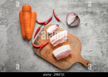 The pork belly and vegetables placed on the table. Stock Photo