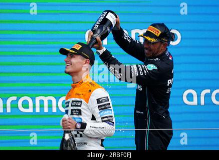McLaren's Lando Norris (left) and Mercedes' Lewis Hamilton celebrate