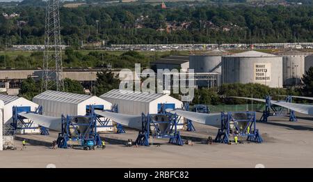 Belfast, Norther Ireland, UK. 7 June. 2023. Wind turbine blades being assembled in Belfast Harbour at the offshore wind terminal before being shipped Stock Photo