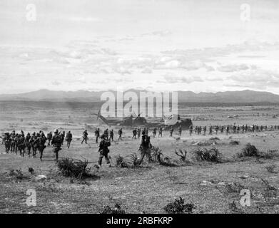 Vietnam:   July, 1966 Marines of H Company, 4th Marine Regiment,  move to waiting helicopters before jumping off to confront the North Vietnamese 324th Division during Operation Hastings. Stock Photo