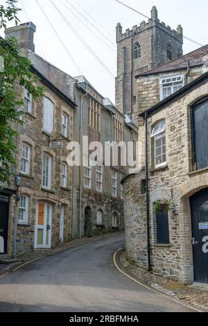 Launceston is a small market town in the county of Cornwall, UK. Looking up Tower St Stock Photo