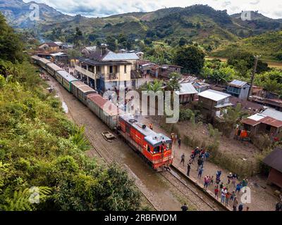 Aerial view Tolongoina station. Old train on the railway line from Fianarantsoa to Manakara, Madagascar, Southeast Africa.  Vintage train traveling th Stock Photo