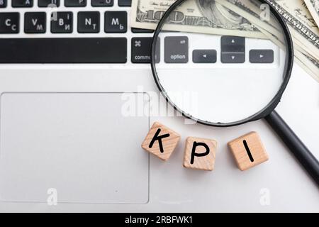 KPI word on cubes. Key performance indicator. Stock Photo