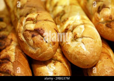 Baguettes in the baking shop. Fresh loaf of bread, bakery products Stock Photo