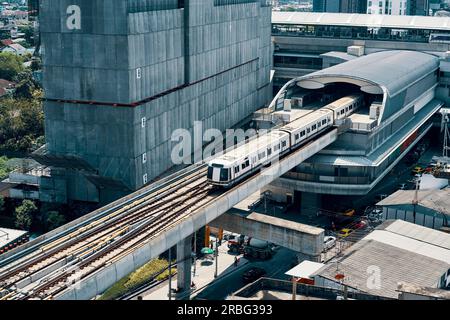 Top view of BTS sky train running in downtown of Bangkok Stock Photo