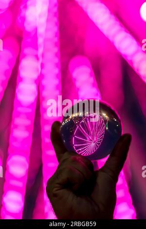 Ferris wheel in the Lens Ball, Philippines Stock Photo - Alamy