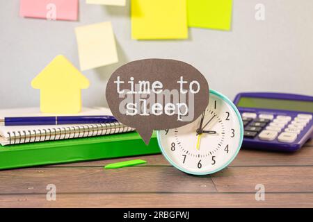 Autumn rain, the inscription on the sweaty glass - time to sleep, window with handwritten words time to sleep Stock Photo