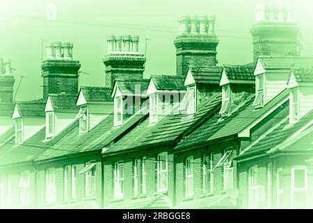 Green background image showing Victorian terraced housing in Basingstoke, UK. Concept: green homes, renewable energy, insulating houses, epc Stock Photo