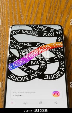 Threads, an Instagram app by Meta, startup / loading screen showing the word threads repeated on a Samsung Galaxy smartphone screen. UK Stock Photo