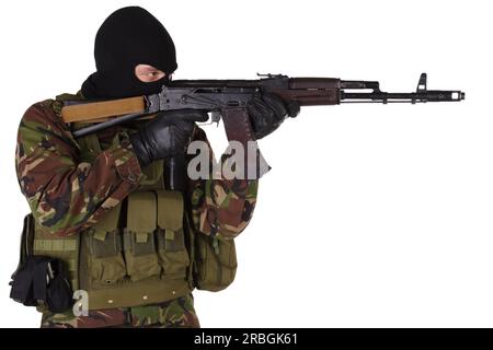 paramilitary soldier fire with kalashnikov gun isolated on white Stock Photo