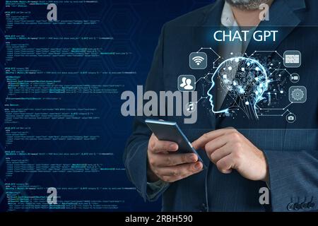 Artificial Intelligence in Bot Chat. Businessman using Ai chatbot in his smartphone. Stock Photo