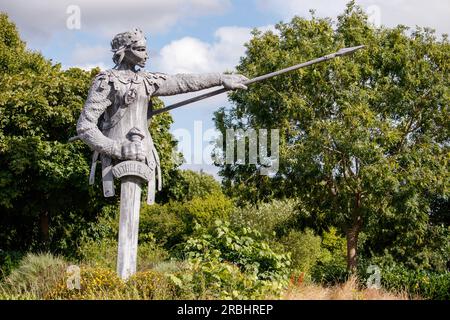 The six metre tall statue of Aethelflaed, the Anglo-Saxon warrior Queen by artist luke Perry situated on the Island outside the railway station in Tamworth, Staffs. Aethelflaed is a key figure from Tamworth’s past, having played a pivotal role in English history by building a chain of fortifications against Viking invaders throughout the Kingdom of Mercia. Her fortification of Tamworth in 913 AD became the forerunner to Tamworth Castle. Daughter of King Alfred the Great, Aethelflaed’s accession as a female ruler has been described as one of the most unique events in early medieval history. Stock Photo