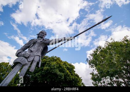 The six metre tall statue of Aethelflaed, the Anglo-Saxon warrior Queen by artist luke Perry situated on the Island outside the railway station in Tamworth, Staffs. Aethelflaed is a key figure from Tamworth’s past, having played a pivotal role in English history by building a chain of fortifications against Viking invaders throughout the Kingdom of Mercia. Her fortification of Tamworth in 913 AD became the forerunner to Tamworth Castle. Daughter of King Alfred the Great, Aethelflaed’s accession as a female ruler has been described as one of the most unique events in early medieval history. Stock Photo