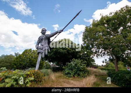 The six metre tall statue of Aethelflaed, the Anglo-Saxon warrior Queen by artist luke Perry situated on the Island outside the railway station in Tamworth, Staffs. Aethelflaed is a key figure from Tamworth’s past, having played a pivotal role in English history by building a chain of fortifications against Viking invaders throughout the Kingdom of Mercia. Her fortification of Tamworth in 913 AD became the forerunner to Tamworth Castle. Daughter of King Alfred the Great, Aethelflaed’s accession as a female ruler has been described as one of the most unique events in early medieval history. Stock Photo