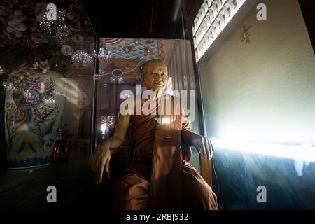 Ayutthaya, Thailand May 30, 2023: portrait of a old Buddhist monk in a temple Stock Photo