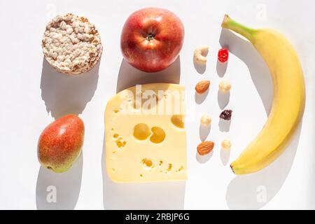 Period diet concept. Foods to eat during menstruation bleeding,flat lay. Feminine critical days products for reduce stomach pain symptoms. Healthy eat Stock Photo