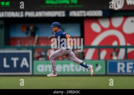 Texas Rangers' Nathaniel Lowe runs the bases after hitting a solo home run  during the fourth inning of a baseball game against the Cleveland Guardians  in Arlington, Texas, Friday, July 14, 2023. (